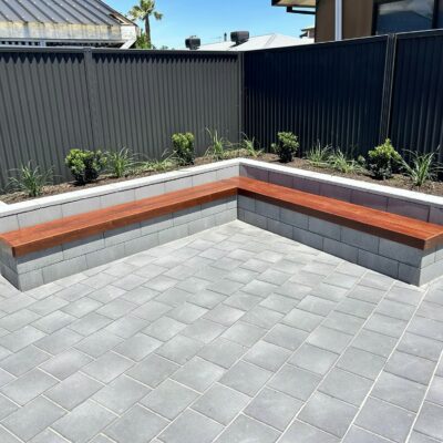 Flagpave Pavers Charcoal | Versasmooth Retaining Wall Block seating | Rosewall Landscaping