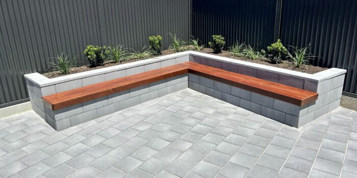 Flagpave Pavers Charcoal | Versasmooth Retaining Wall Block seating | Rosewall Landscaping