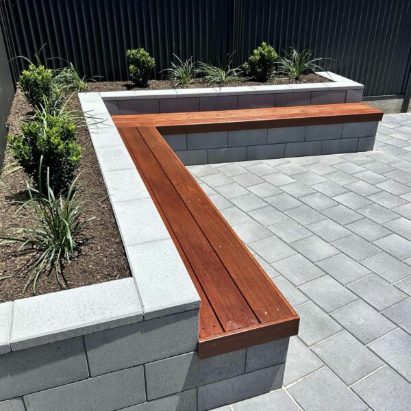 Versasmooth Retaining Wall Blocks seating | Flagpave Pavers Charcoal | Rosewall Landscaping