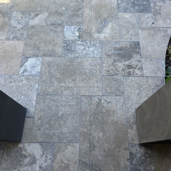 12mm Oyster Travertine French Pattern tiles entrance porch | Hourigan Landscaping