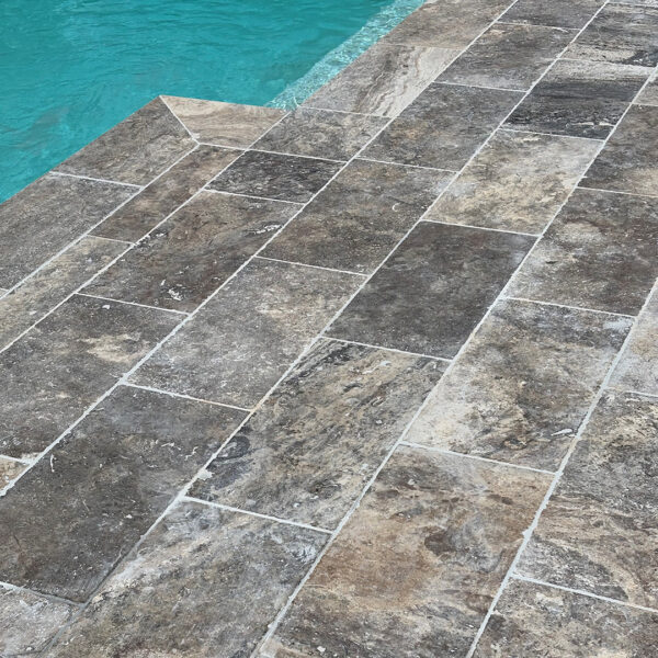 Silver Travertine 30mm Pool Paving with drop face | MTK Carpentry Construction.jpeg