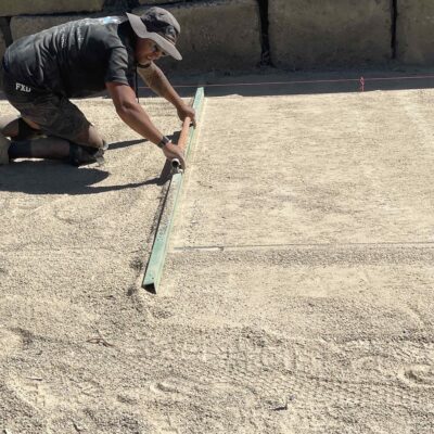 Screeding paving base prep work